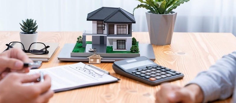 SMSF Property Loan Settlement Process Client signing SMSF limited recourse borrowing arrangement documents with mortgage broker